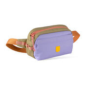 A small bag with a purple front, tan top, orange zippers, and an orange adjustable strap.