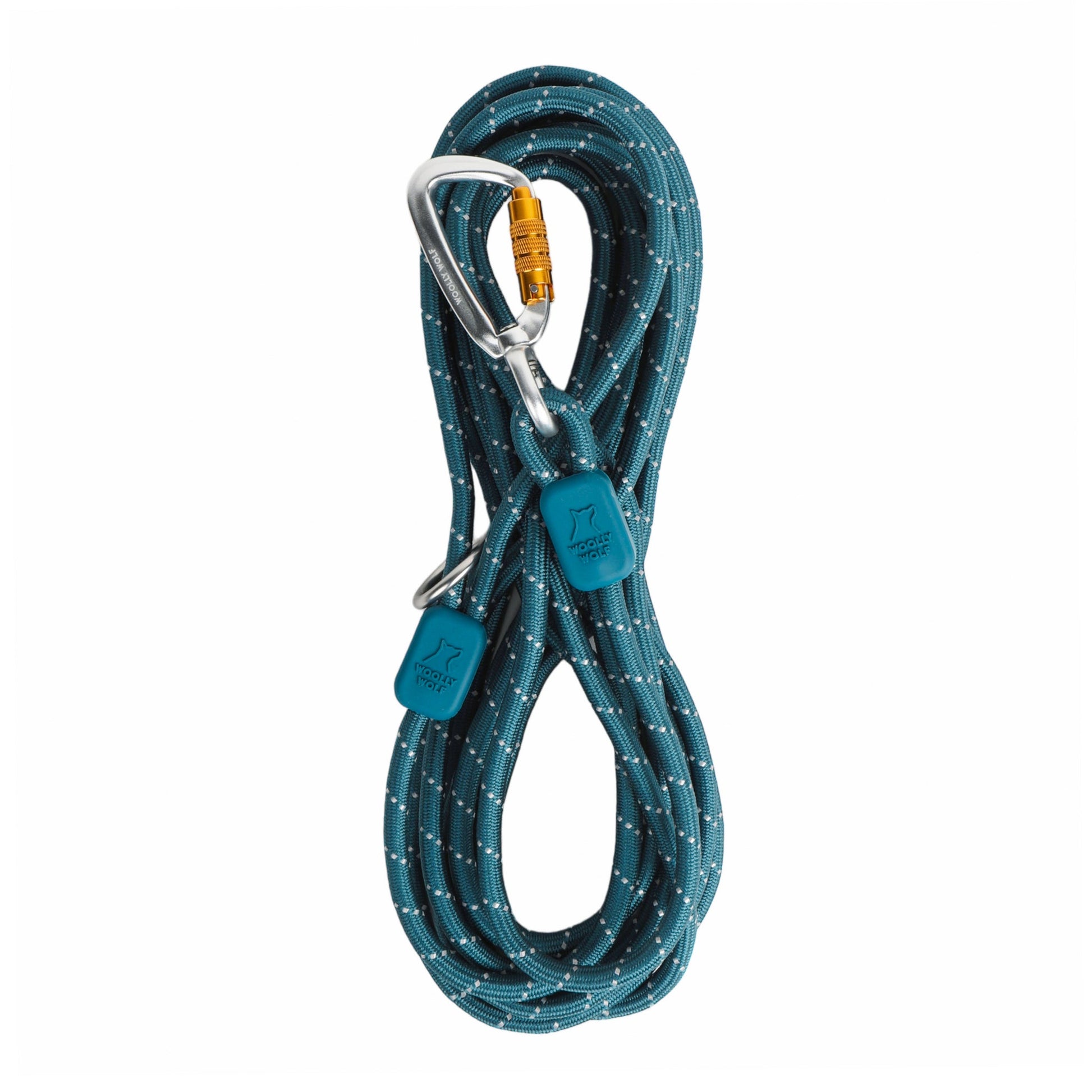 The Long Rope Dog Leash Deep Teal is coiled neatly, secured with two matching straps, and attached to a silver carabiner with an orange lock.