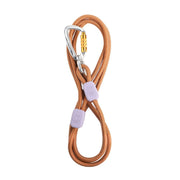 The Rope Dog Leash Thin Terracotta features an orange braided design with two purple stoppers and a silver locking carabiner, displayed on a white background.