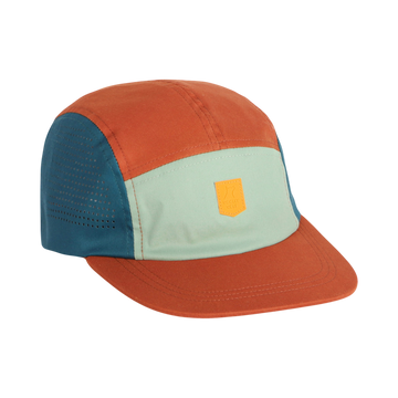 Color-blocked cap with orange, teal, and mint green panels and a yellow patch on the front.