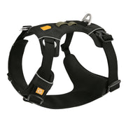 Black dog harness with adjustable straps and metal leash attachment point.