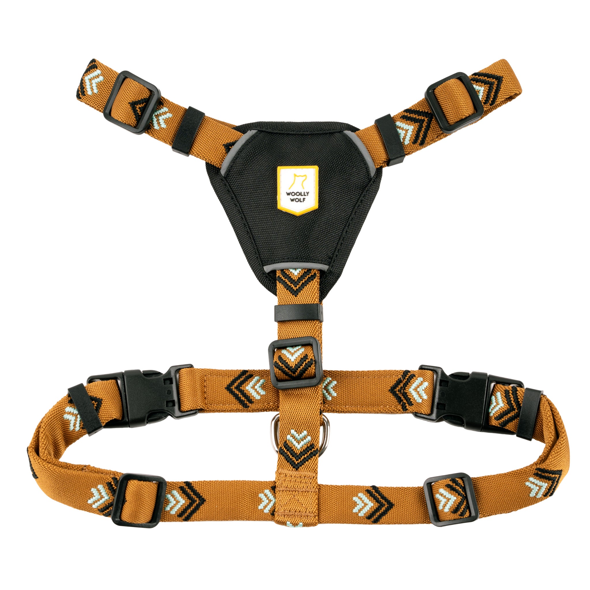 Brown and black adjustable dog harness with geometric patterns and a Woolly Wolf logo on the chest piece.