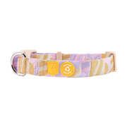 A pink, tan, and lavender striped dog collar with metal ring and yellow Recycled Dog Gear tag.