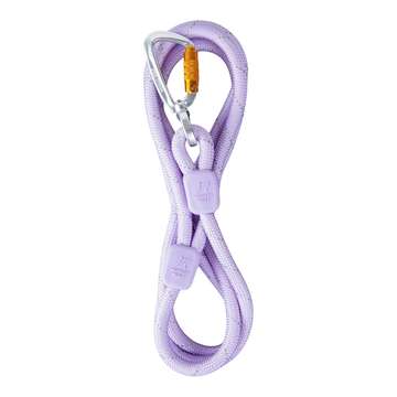 A lavender climbing rope looped with a silver carabiner and two lavender rope protectors.