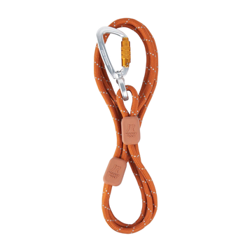 Orange rope leash with white accents, two leather tags, and a silver locking carabiner on a white background.